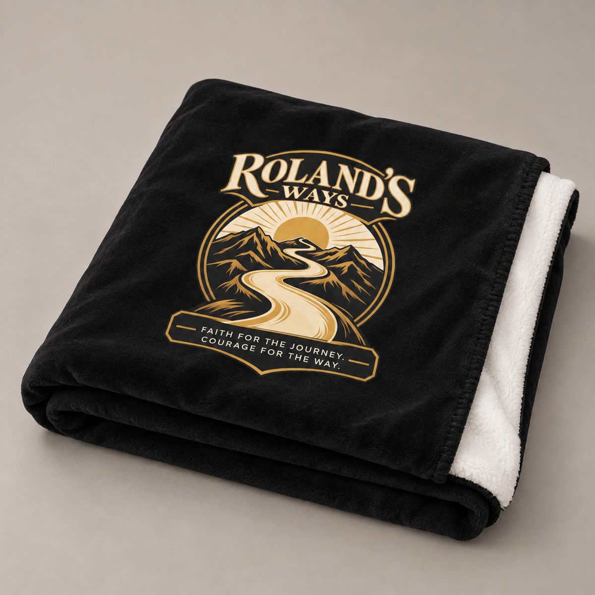 Gold mountain-road emblem on black Faith for the Journey blanket