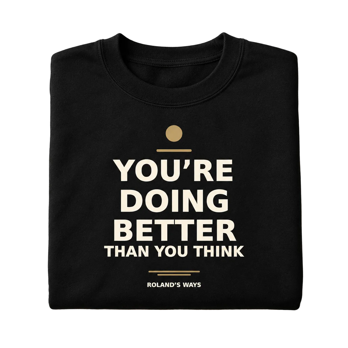 Folded black crewneck showing the full You’re Doing Better Than You Think design and Roland’s Ways signature.