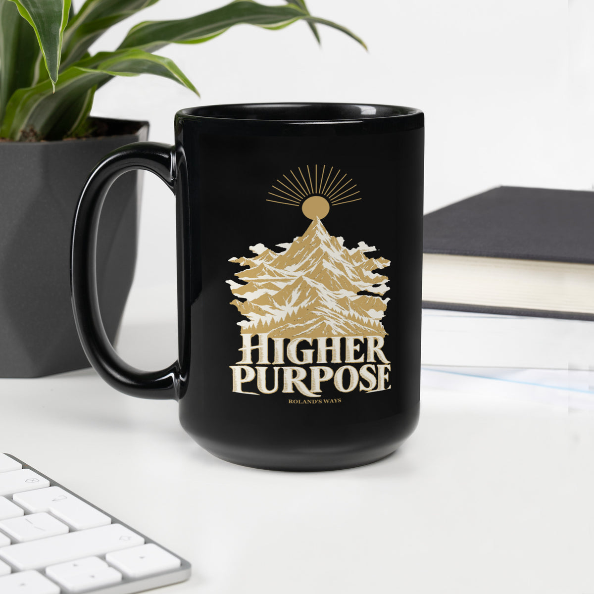 Higher Purpose Black Glossy Mug in black, with handle on the left with gold and ivory Journey artwork.