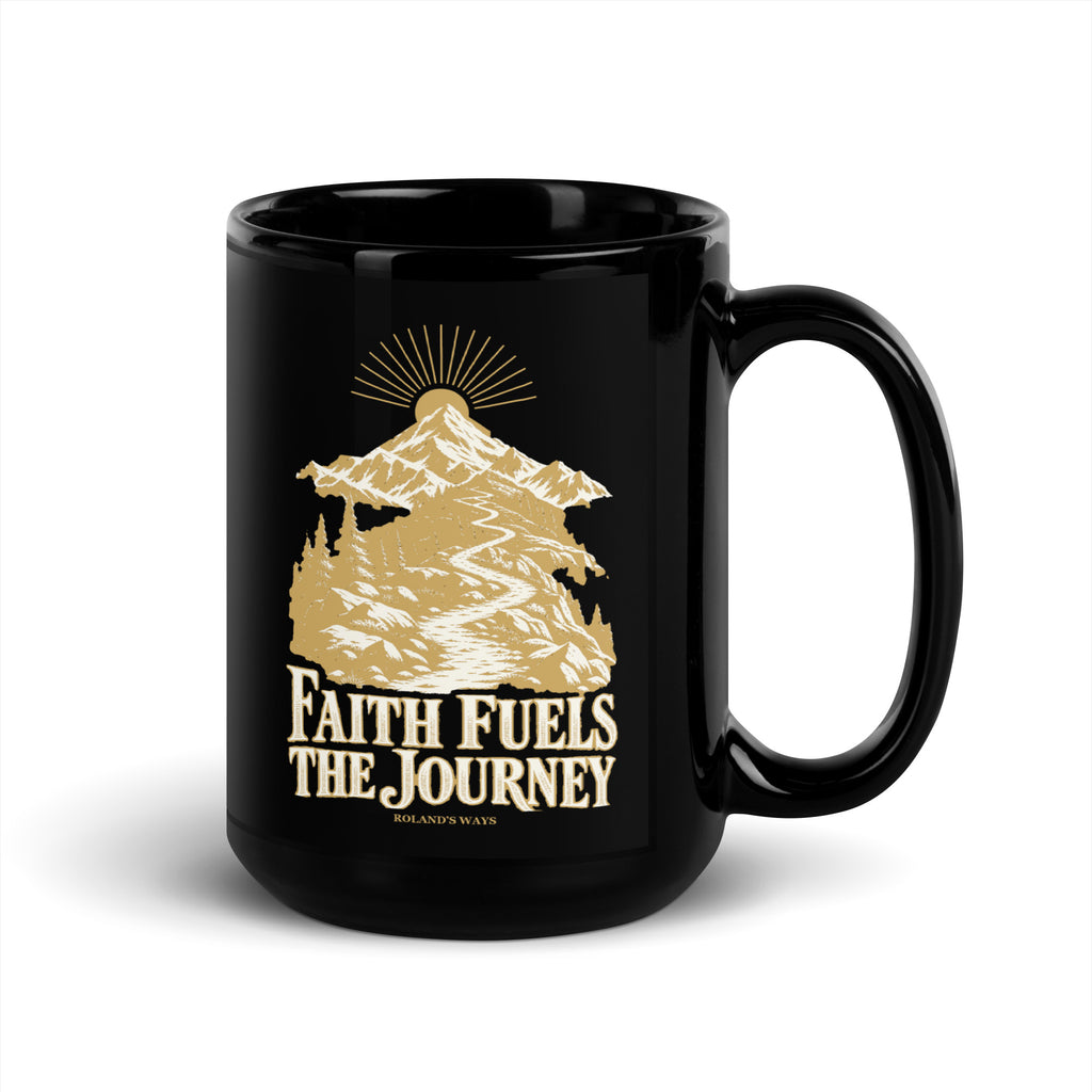 Faith Fuels the Journey Black Glossy Mug in black, with handle on the right with gold and ivory Journey artwork.
