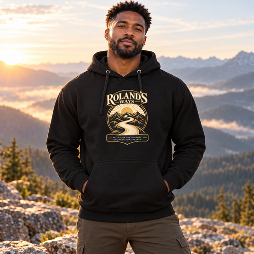AI lifestyle mockup of a man wearing the black Faith for the Journey Premium Hoodie at a mountain overlook.