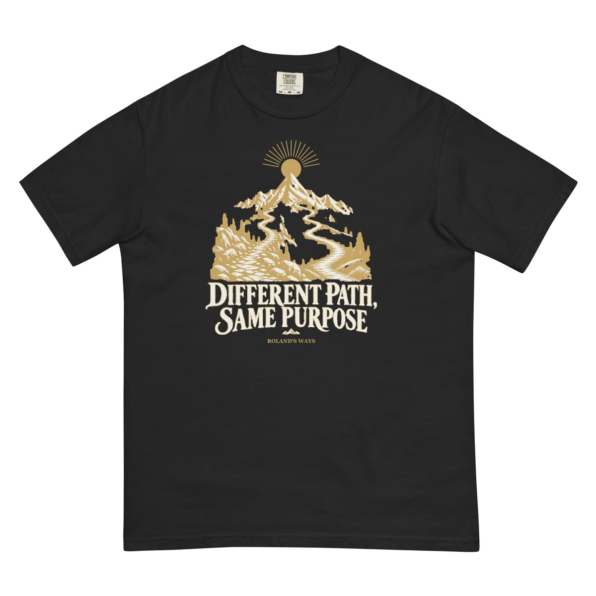 Front product mockup of the black Different Path, Same Purpose T-shirt with gold and ivory mountain artwork.