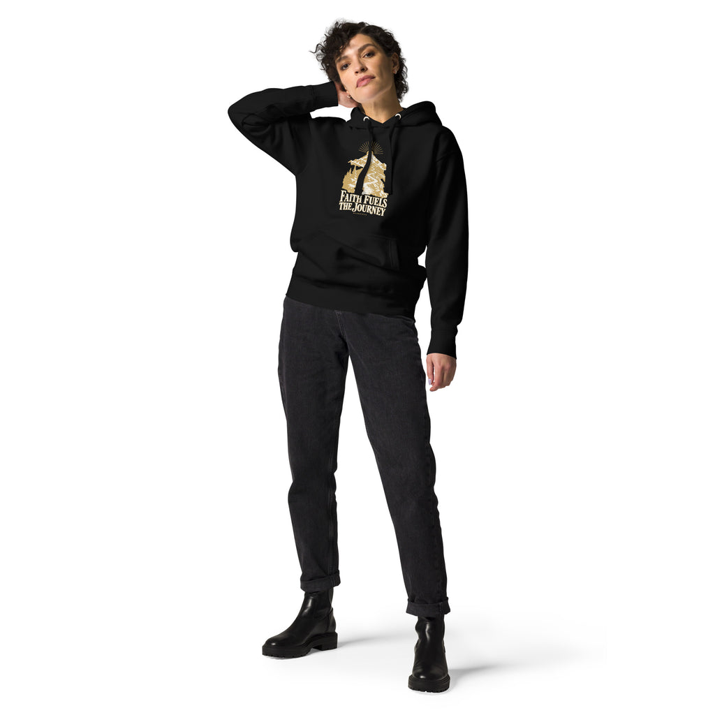 Faith Fuels the Journey Premium Hoodie in black, front view with gold and ivory Journey artwork.