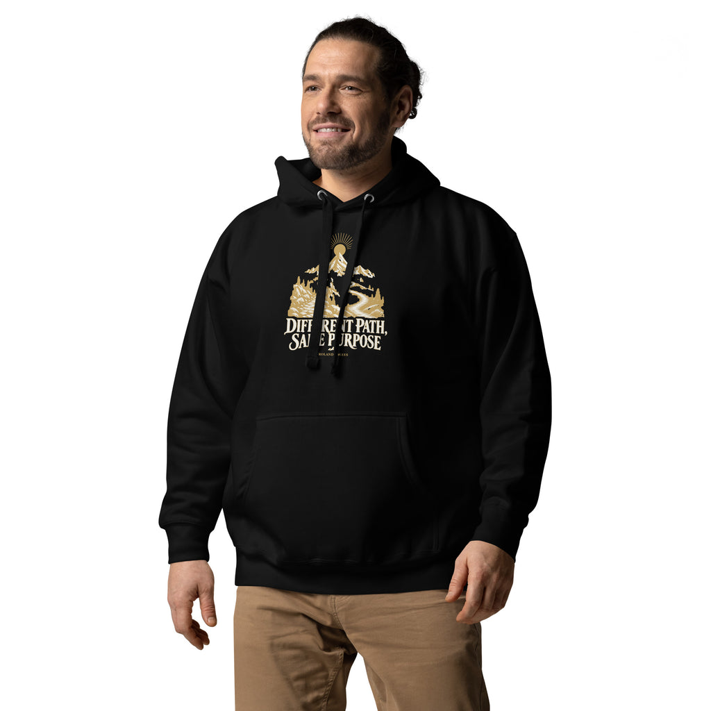 Different Path, Same Purpose Premium Hoodie in black, from a front-left angle with gold and ivory Journey artwork.